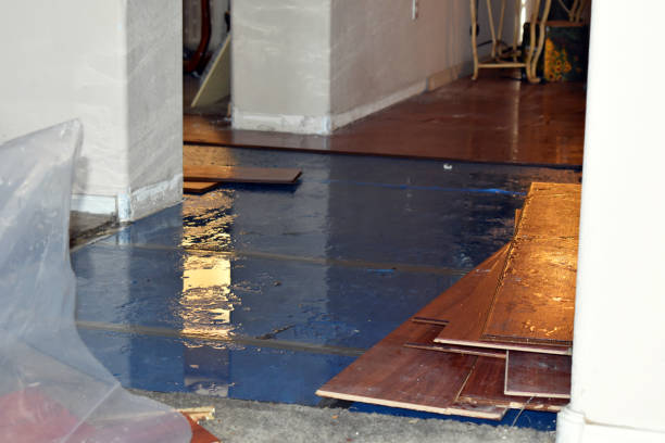 Professional Flood Cleanup technician working in Warwick, MA